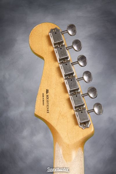 File:Fender-road-worn-60s-strat-head-stock-back.jpg